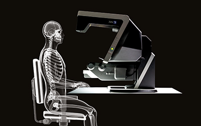 Skeleton sitting at table representing ergonomic working position at DRV 3d Stereo microscope