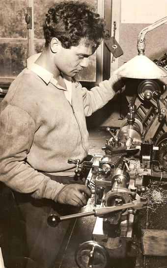 a young Rob Freeman, Founder of Vision Engineering Ltd, working at a lathe