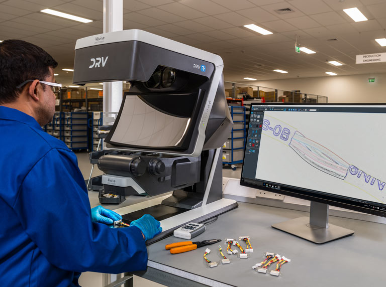 DRV-Z1 being using in workshop by man in blue overall