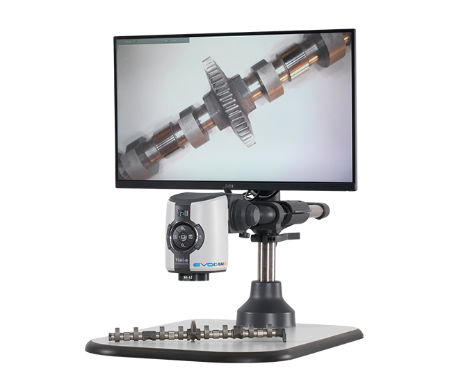 Monitor mounted on digital microscope showing metal precision components