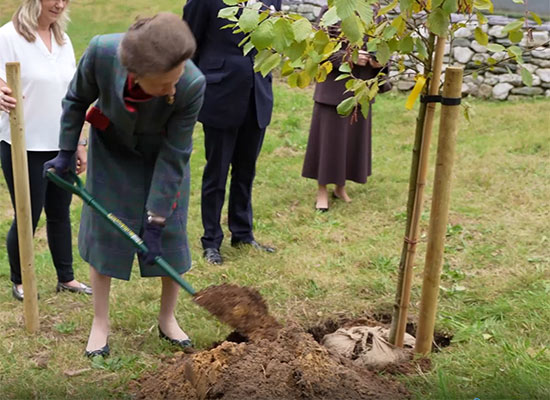 HRH Princess Anne planting Alder tree at Vision Engineering HQ