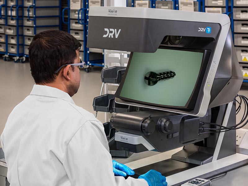 Titanium bone screw inspection under magnification with DRV-Z1