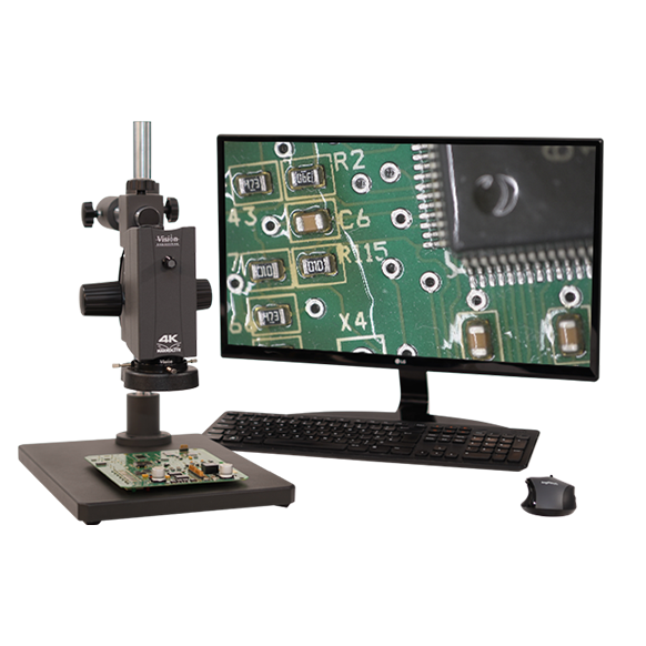 Makrolite 4K digital microscope next to monitor showing PCB