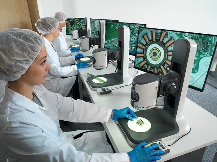 AB Vision 129-700×525 Operators inspecting PCBs with EVO Cam II